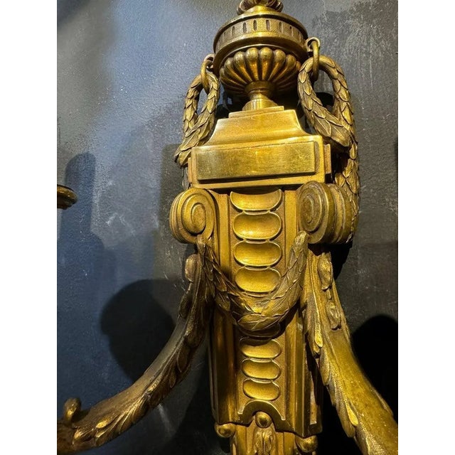 Great pair of Caldwell gilt bronze sconces with neoclassic design.Original finish and patina.