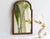 An antique arched wooden mirror with a nice scalloped frame made in the 19th century in the Netherlands. The mirror dates...