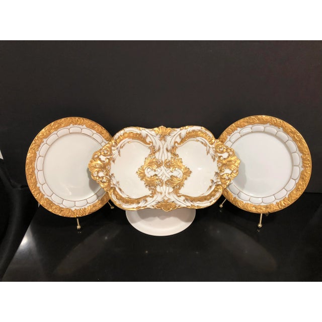 Antique Meissen early 20th century, 12”x 8” with beautiful gold highlights tray. Other two 7.5” plates made in the late...