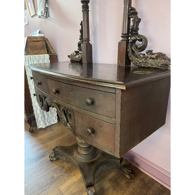 American Empire Dressing Table or Writing Table with Pedestal Base and clawfeet. Featuring 2 prominent upright posts with...