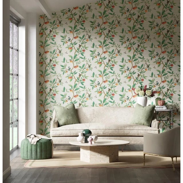 This charming interpretation of an antique chinoiserie wallpaper depicts stylised birds and ripe fruits. A modern take on...