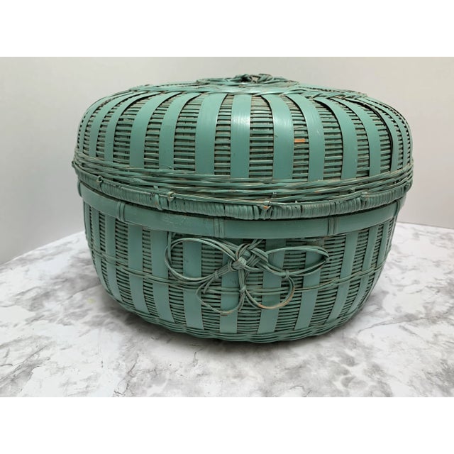 Vintage Asian country chinoiserie earthy decor and storage basket in a soft blue. Unexpected decor or storage vessel...