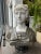 A reclaimed 20th century Neoclassical style bust of a female figure, the head in Staturio marble with hair back and up....