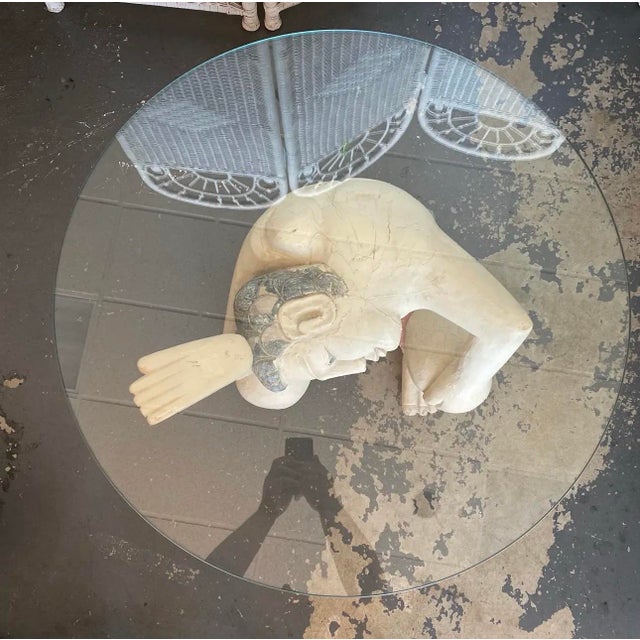 1970s Vintage Balinese Kneeling Figure Sculptural Coffee Table With Round Glass Top | Hollywood Regency Exotic Figural Art Table For Sale - Image 5 of 8