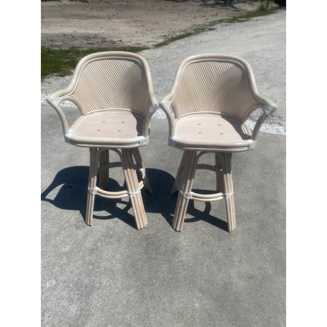 Fabulous set of Boho Chic Beige Pencil Reed Rattan Swivel Bar Stools. These beige bar stools are sturdy, in excellent...