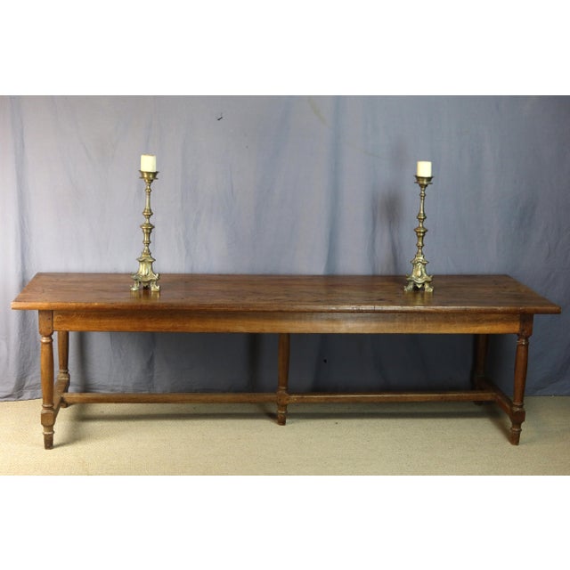 Very large oak table on a stretcher base, dating from the second half of the 19th century. This table is in good overall...