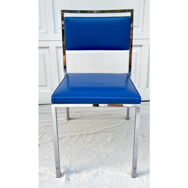 Here is a wonderful bright blue and steel chair from the later 20th century, most likely the 1970-80's. It was made by...