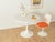 A unique Tulip dining table from the 1960s with a white plastic tabletop and a white aluminum base. Quality features:...