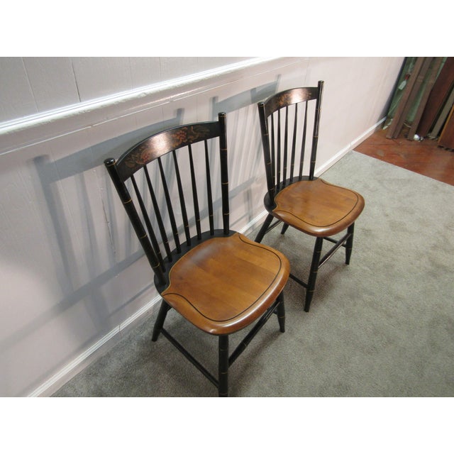 Item 87155: Hitchcock pair of paint decorated chairs. Age: 1980's. Details: Black and gold paint. Condition: Very clean...