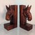 Add rustic elegance and timeless craftsmanship to your bookshelf with this **Vintage Pair of Hand-Carved Wood Horse Head...