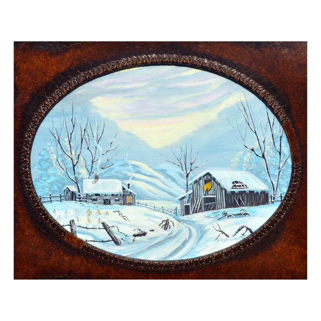 Snowy oval shaped landscape of a barn and a cozy log cabin in a scenic winter wonderland by Ginger Sammell (American, 20th...