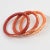 Contemporary Galalith Carved Spacer Bracelet Bangle Orange Variation Trio For Sale - Image 3 of 6