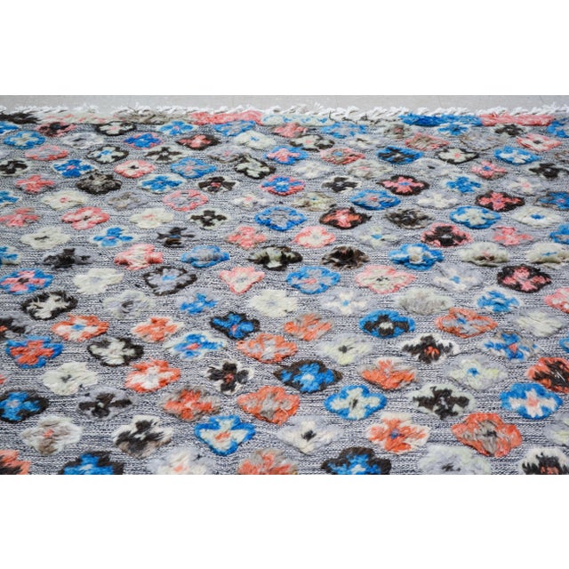 Moroccan Azilal hand knotted rug with natural colors, contemporary style and soft texture.