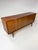 1960's Mid Century Scandinavian Teak Credenza. 4 doors conceal adjustable shelves and drawers. Key included.