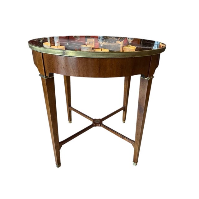 Baker McMillen Collection marble top side table. The McMillen collection was line of continental furniture drawn from the...