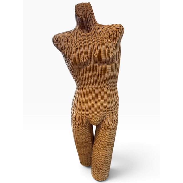 Rare and striking vintage sculptural wicker figure dating to the 1970s. Handwoven entirely in natural-toned wicker/rattan,...