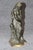 beside a beautifully modeled rocky formation, which serves both as a naturalistic sculptural element and as a visual...