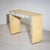Vanity console featuring three drawers and a fully mirrored front. The spherical drawer pulls provide a subtle decorative...
