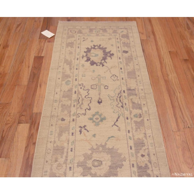 A Beautifully Decorative And Versatile Soft Ivory Cream Background Pastel Color Tribal Geometric Turkish Oushak Design...