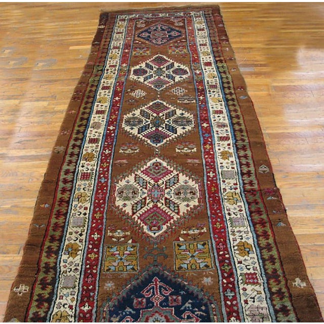 Antique Persian Serab rug, measures: 3'6" x 12'8".