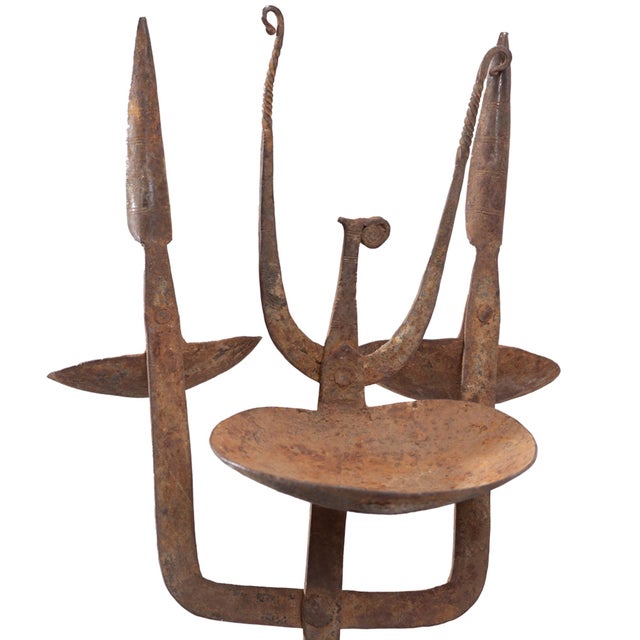 Ritual oil lamp from the Dogon/Bambara Peoples of West Africa. Crafted by a blacksmith of forged iron with three trays for...