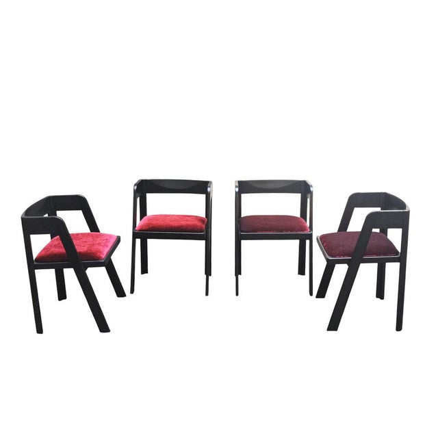 Set of 4 black stained wooden chairs with ruby red velvet seats, originally from the Programma C collection, designed by...
