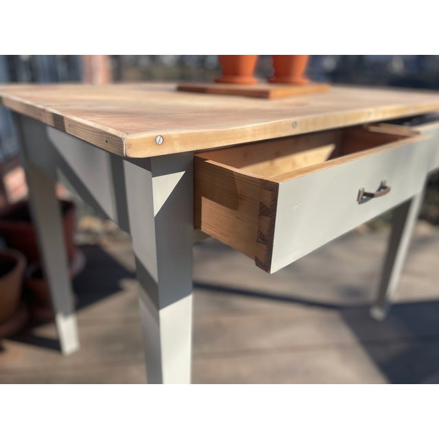 This charming antique table has been given a fresh coat of paint, sanded, and oiled. Width: 110 cm Depth: 72 cm Height: 78...