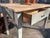 This charming antique table has been given a fresh coat of paint, sanded, and oiled. Width: 110 cm Depth: 72 cm Height: 78...