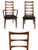 These Danish-designed chairs from the 1950s/1960s feature a distinct ladder-back constructed with solid teak frames and...