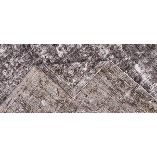 Vintage hand-knotted Persian Meshad distressed rug with a medallion motif. This piece has great detailing and a beautiful...