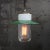 Porcelain Industrial hanging lamp. White porcelain, brass and clear glass. green enamel shade 2 conductors, no ground....