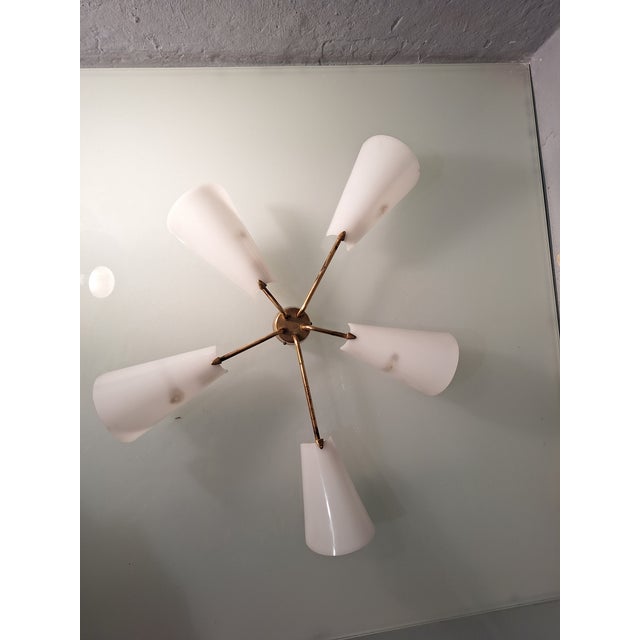 Star-Shaped Wall Lamp in Brass and Acrylic Glass Lumen from Lumen Milano, 1950s, in Good conditions. Designed 1950 to 1959...