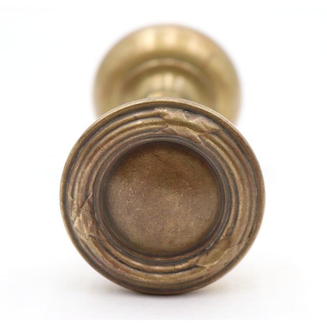 Vintage concentric passage door knobs made of hollow brass with a patina finish. Priced as a pair of knobs with a spindle....