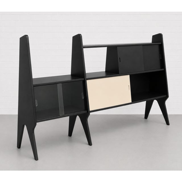 Italian Mid Century Modern extra-long wall unit in sleek black lacquer, inspired by the iconic designs of Gio Ponti....