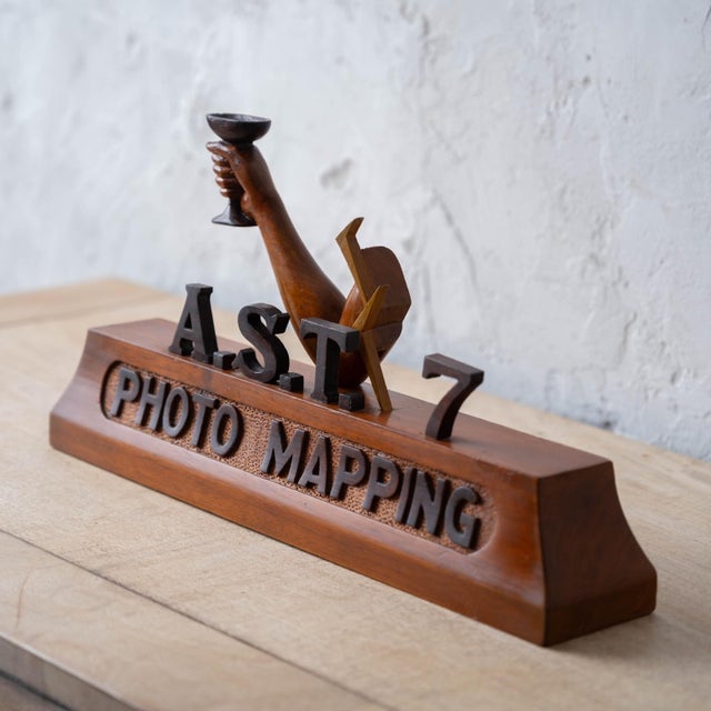 A wood desk trophy commissioned for A.S.T. 7 PHOTO MAPPING — "Air Survey Team 7," one of the composite aerial survey teams...