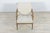 The armchair were produced by the Czechoslovakian company TON in the 1960s. The beech elements have been cleaned and...