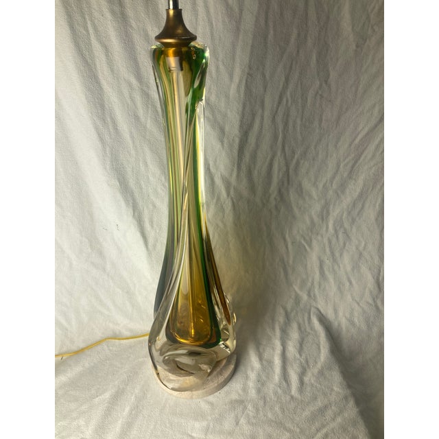 Very few off these highest quality Seguso lamps are available on the market. I love the way the glass is pulled from the...