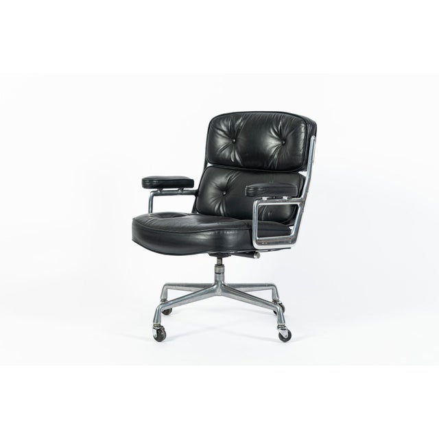 This vintage mid century modern black Model 3475 Eames Time Life Executive Lobby Chair designed by Charles & Ray Eames for...