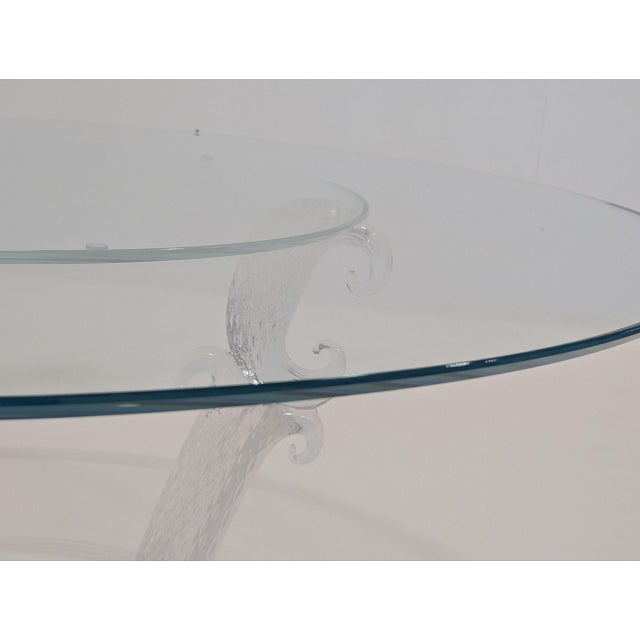 Glass table with a 10mm clear glass top and clear Murano base. The base is hand blown. Only one person in the world...