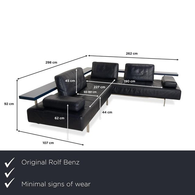 We present to you the Rolf Benz Dono 6100 leather corner sofa in dark blue with manual reclining function. I have official...