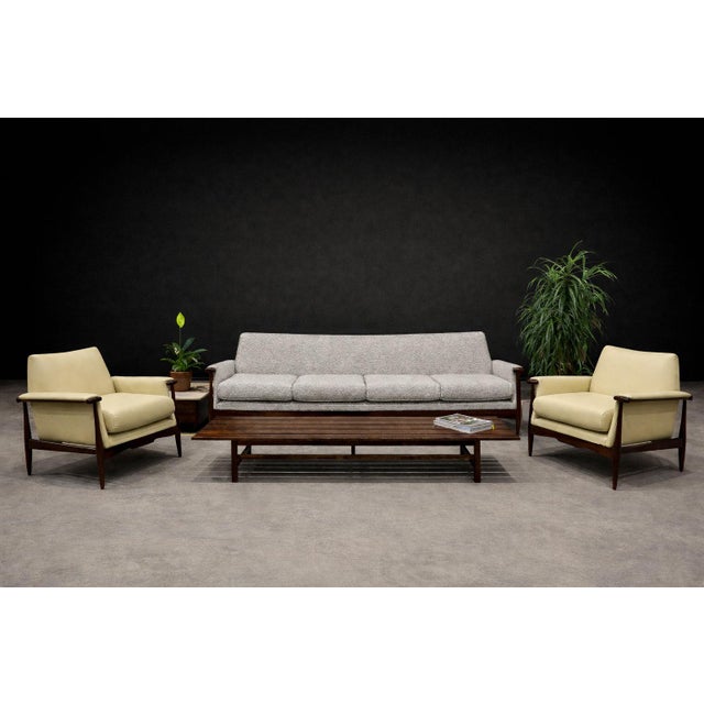 Produced in the 1960s at the Liceu de Artes e Ofícios, this pair of armchairs reflects the academic rigor and craft...