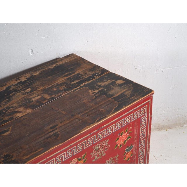 Antique chinese painted trunk in pine wood, traditional storage furniture with polychrome decoration originating from...