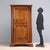 Small Baroque walnut wardrobe made from antique furniture. Paneled front door, divided into two parts with high-relief...