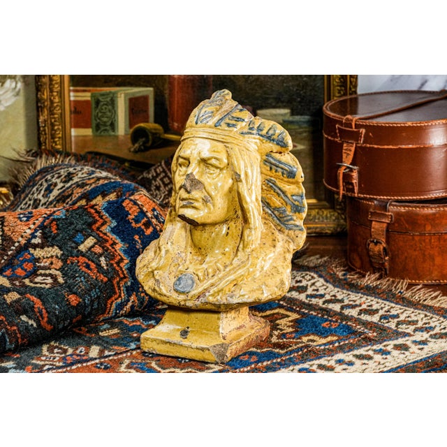 This evocative circa 1900 hand-painted majolica bust is a distinctive home décor statement, perfectly suited for display...