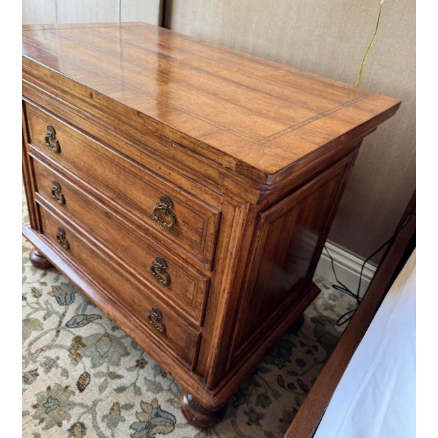 Gorgeous Bachelors Chest bench made by Bausman & Company. The top has beautiful inlay and marquetry work. Also has a...