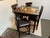 Design Plus Gallery presents a Bistro Dining Set in Dark Wood and Contemporary Styling. The four chairs have elevated bar...