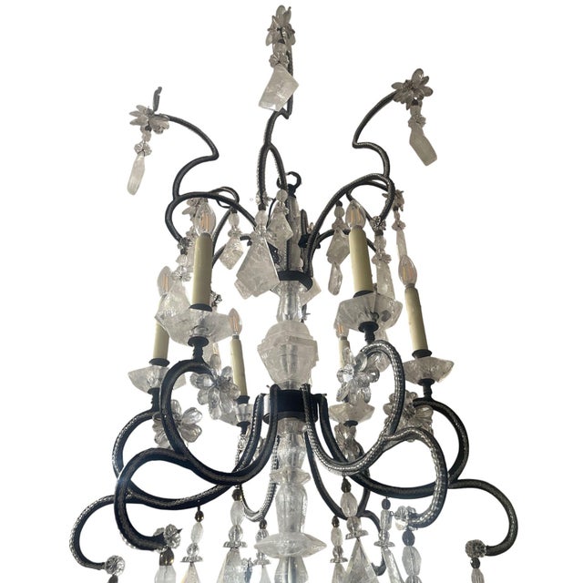 Dramatic Italian rock crystal chandelier with an abundant arrangement of hand-cut rock crystal drops, flowers, prisms,...