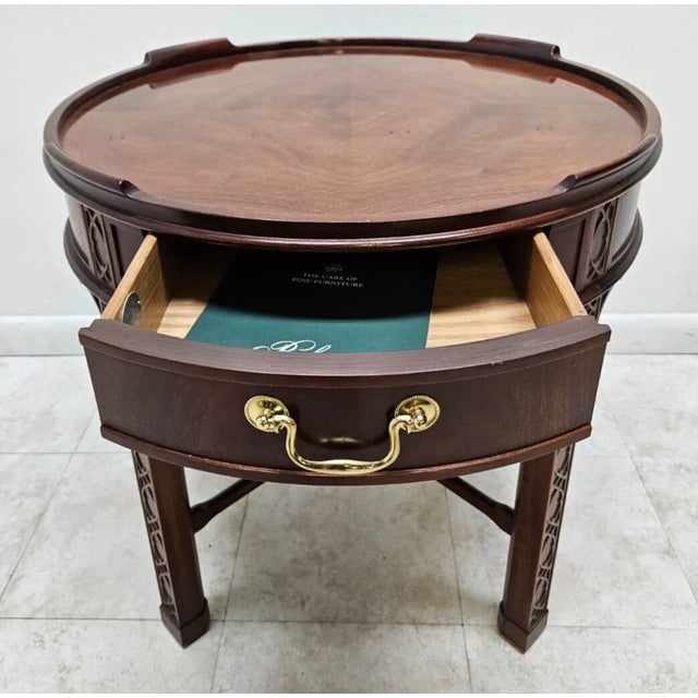 Wonderful Baker furniture end table in excellent condition. Flame mahogany book match veneer. Please see photos as they...