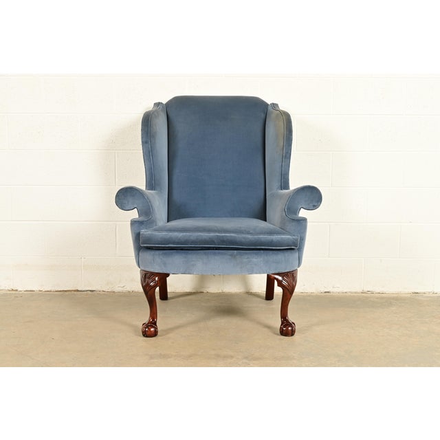 A gorgeous Chippendale or Georgian style wingback library chair, lounge chair, or fireside chair By Kindel Furniture USA,...