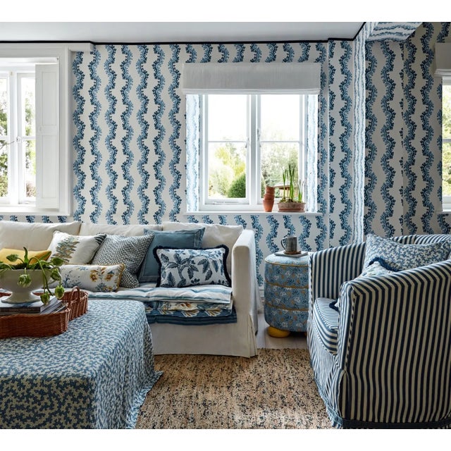 Meandering across a valley floor and surrounded by tall trees Oxbow is a stylised river design with a chalky surface...